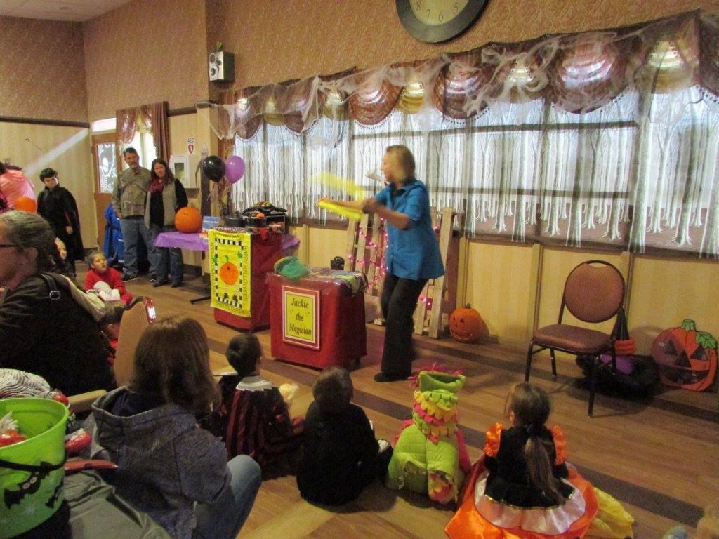 Jackie the Magician performing for children's audience.